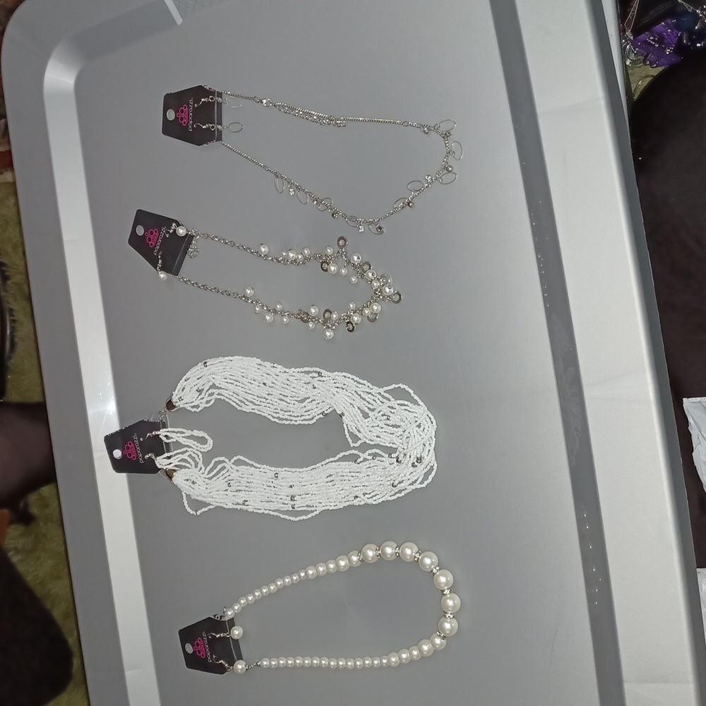 Lot of 4 silver pearl necklaces and earrings sets